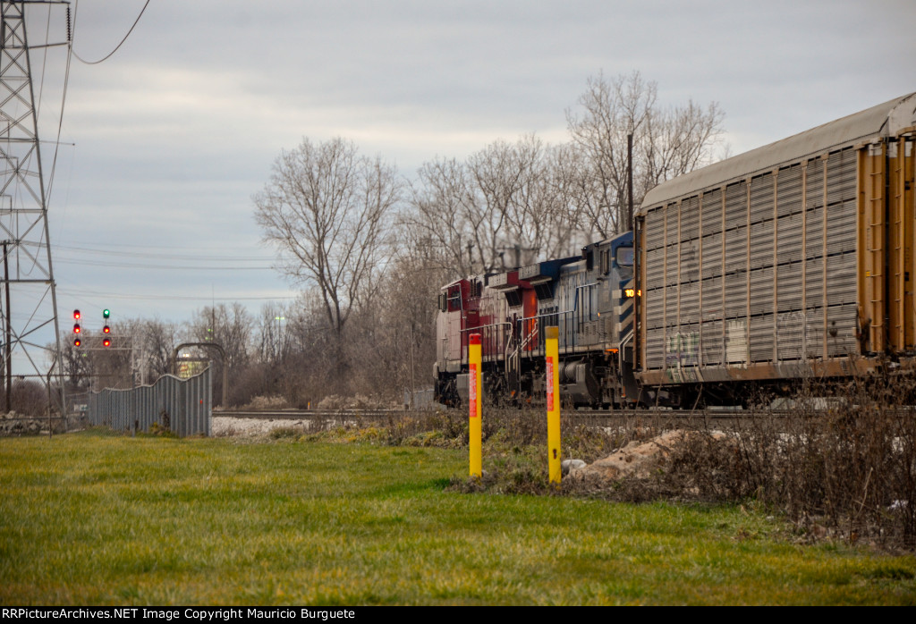 CP + CEFX AC44CW Locomotives leading a train